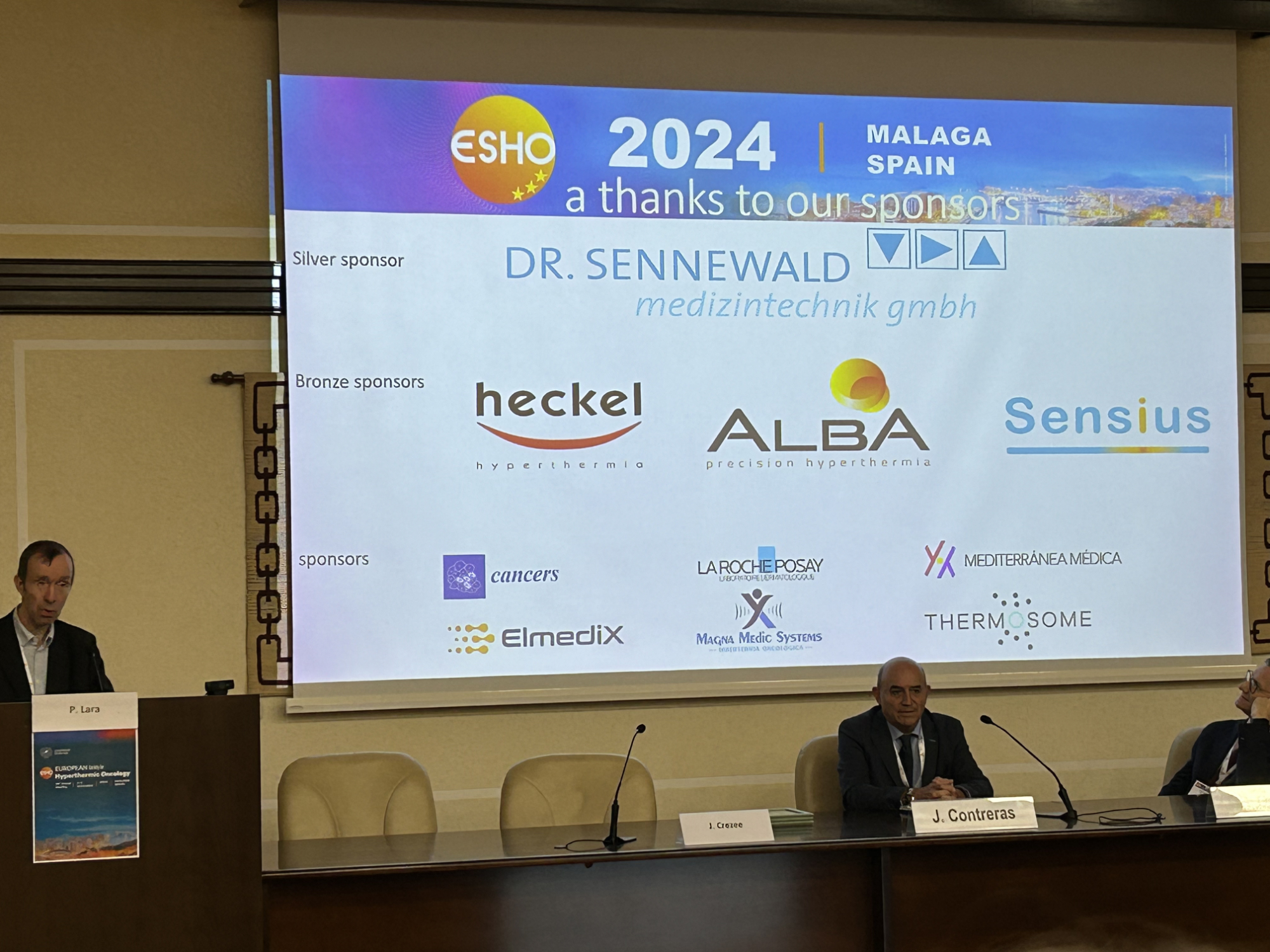 heckel news 2025 ESHO24 ESHO president Hans Crezee with a slide of the sponsors